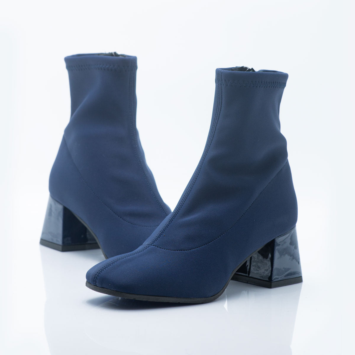 Figini - Blue fabric Ankle Boot with a laser-cut design.
